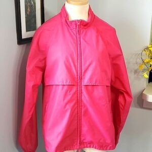LANDS END, pink windbreaker. Zipper closure. Zipper pockets. SIZE LARGE.